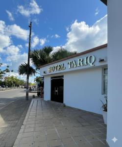 a hotel haribo sign on the side of a building at Hotel Tariq Monteria in Montería +21 photos