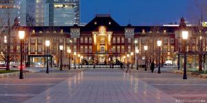 a large building with lights in front of it at Bon House Tokyo Private Luxury Retreat with Free Parking Reservation Required in Tokyo