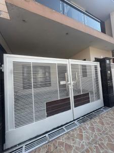 a room with a large air conditioner on a wall at Auranest Stays Duplex Home in Ludhiana