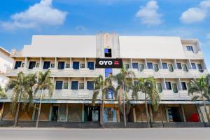 a white building with a one sign in front of it at Hotel O Star Inn in Hyderabad +22 photos