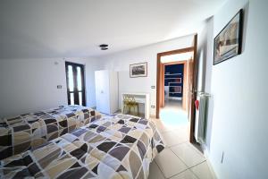 a bedroom with a bed in a room at La Terrazza Sidicina Home in Teano