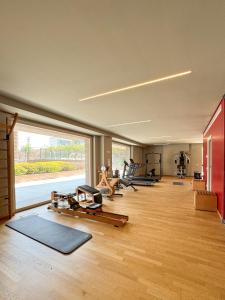 a gym with several exercise equipment in a room at ArtStay - Luxury Apt 1 Gym and Pool in Milan