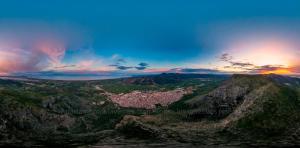 a view of a city from the top of a mountain at Apartamento moderno en el centro de Tavernes in Tavernes de Valldigna