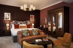 a hotel room with a bed and a couch at Francis Hotel Bath in Bath