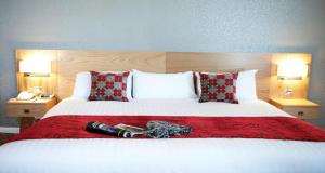 a bedroom with a large bed with a bottle on it at Best Western Plus Nottingham Westminster Hotel in Nottingham +58 photos