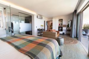 a bedroom with a bed and a living room at Atholl House in Cape Town +87 photos