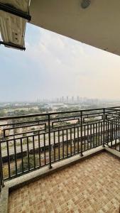 a view of the city from the top of a building at Skybloom stays in Greater Noida