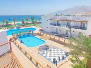 an aerial view of a house with a swimming pool at Panda resort in Dahab
