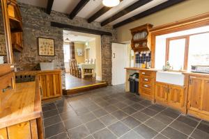 a kitchen with a sink and a counter top at Making Tracks Hostel in Portlaoise +14 photos