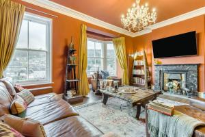 a living room with a couch and a fireplace at 5 Bed in Llangollen oc-l34205 in Llangollen