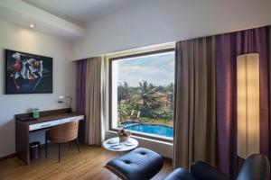 Bazén v ubytování Purple Palms Resort & Spa nebo v jeho okolí