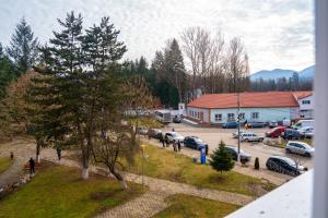 a view of a parking lot with cars parked at Studio Vata in Vaţa de Jos