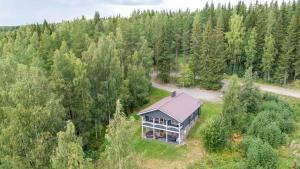 an aerial view of a house in the woods at Himospeili in Jämsä
