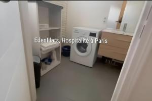 a bathroom with a washing machine in a room at Citronnelle, 2 Chambres, 3 min Métro 8 in Maisons-Alfort