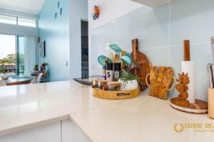 a kitchen with a counter top with some items on it at Sapphire Heaven in Woorim