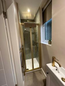 a bathroom with a shower and a sink at BROOMBANK, Melrose in Gattonside +12 photos