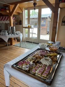 a tray of different types of food on a table at B&B Warnstee in Wichmond +29 photos