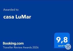a screenshot of a cell phone with the text upgraded to casa luminer at casa LuMar in Atins
