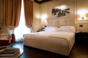 Cama o camas de una habitación en Be ONE - Ricci Collection