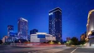 a city skyline at night with tall buildings at EVEN Hotel Xi'an High-Tech Zone by IHG in Xi'an