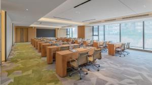 a large room with desks and chairs in a classroom at EVEN Hotel Xi'an High-Tech Zone by IHG in Xi'an