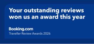 a blue sign that says your outstanding reviewers won us an award this year at Haven Lakeland 3 Bed Luxury Caravan in Flookburgh
