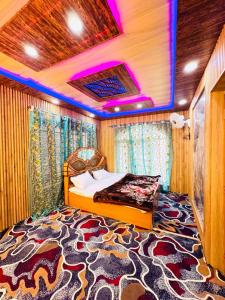 a bedroom with a bed and a rug at Dal frozen in Srinagar +6 photos