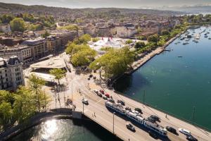 an aerial view of a city with a bridge and a river at Horizon 62 I Zürich Lakeside Apartment I Modern I Free Parking I Self-Check-In in Richterswil +74 photos