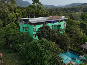 an aerial view of a building in the forest at Morakot Lanta Resort in Ko Lanta