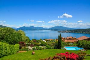 a house with a view of a lake at Villa Marta in Meina