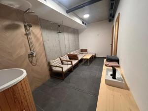 a bathroom with a shower and a sink at Apartmánový dom DK Ateliér in Dolný Kubín +76 photos