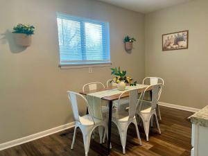 a dining room with a table and chairs at Hillside Haven - affordable and convenient in Chattanooga