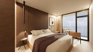 a bedroom with a large bed and a balcony at Resort Cupidon Neptun in Neptun
