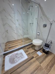 a bathroom with a shower and a toilet at Hotel Casa Blanca - Adults Only in Rio de Janeiro