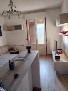 a kitchen with a wooden counter top in a room at B&B 3B Cavriana in San Valentino