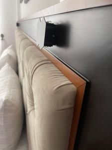 a couch sitting next to a wall with a drawer at inner pease in Nikawatawana