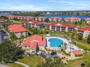 an aerial view of a resort with a swimming pool at Bouchelle Island 203 in New Smyrna Beach