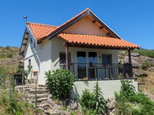 a house in the middle of a hill at Quinta da Estrela in Ponte Nova +45 photos