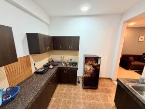 a kitchen with a sink and a counter top at La vida in Nalmatha