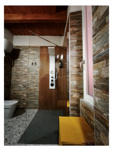 a bathroom with a glass shower with a toilet at Villa Nunziante Grand Estate, Pompei in Scafati +178 photos