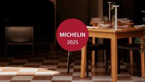 a table with a red sign that reads mitzlin at Hotel Pod Różą in Krakow