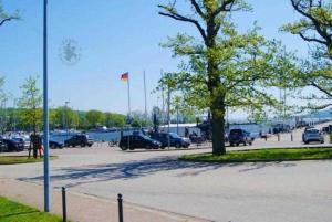 a parking lot with cars parked in a parking lot at Ferienwohnung 7 Katharina mit Balkon in Lauterbach