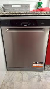 a stainless steel dishwasher in a kitchen at Serenity Gelves in Gelves