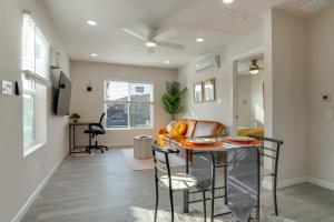 a kitchen and living room with a table and chairs at Great for Digital Nomads! Convenient Manteca Apt in Manteca