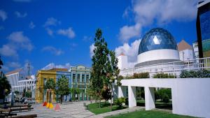 a large building with a dome on top of it at Holiday Inn Fortaleza by IHG in Fortaleza