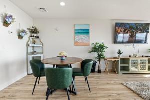 a dining room with a table and chairs at Crescent Beach Motel in Crescent City +40 photos