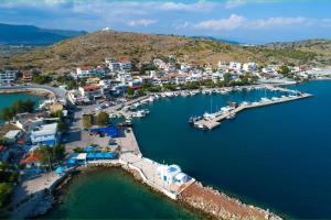 an aerial view of a harbor with boats in the water at DiMarS in Megara