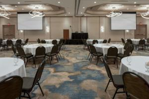 a conference room with white tables and chairs at Oshkosh Marriott Waterfront Hotel & Convention Center in Oshkosh