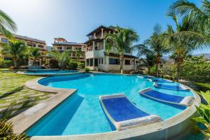 an image of a swimming pool at a resort at Coco Sunset Hills 52 in Coco