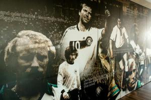 a poster of a hockey player on a wall at Motel One München-Garching in Garching bei München
